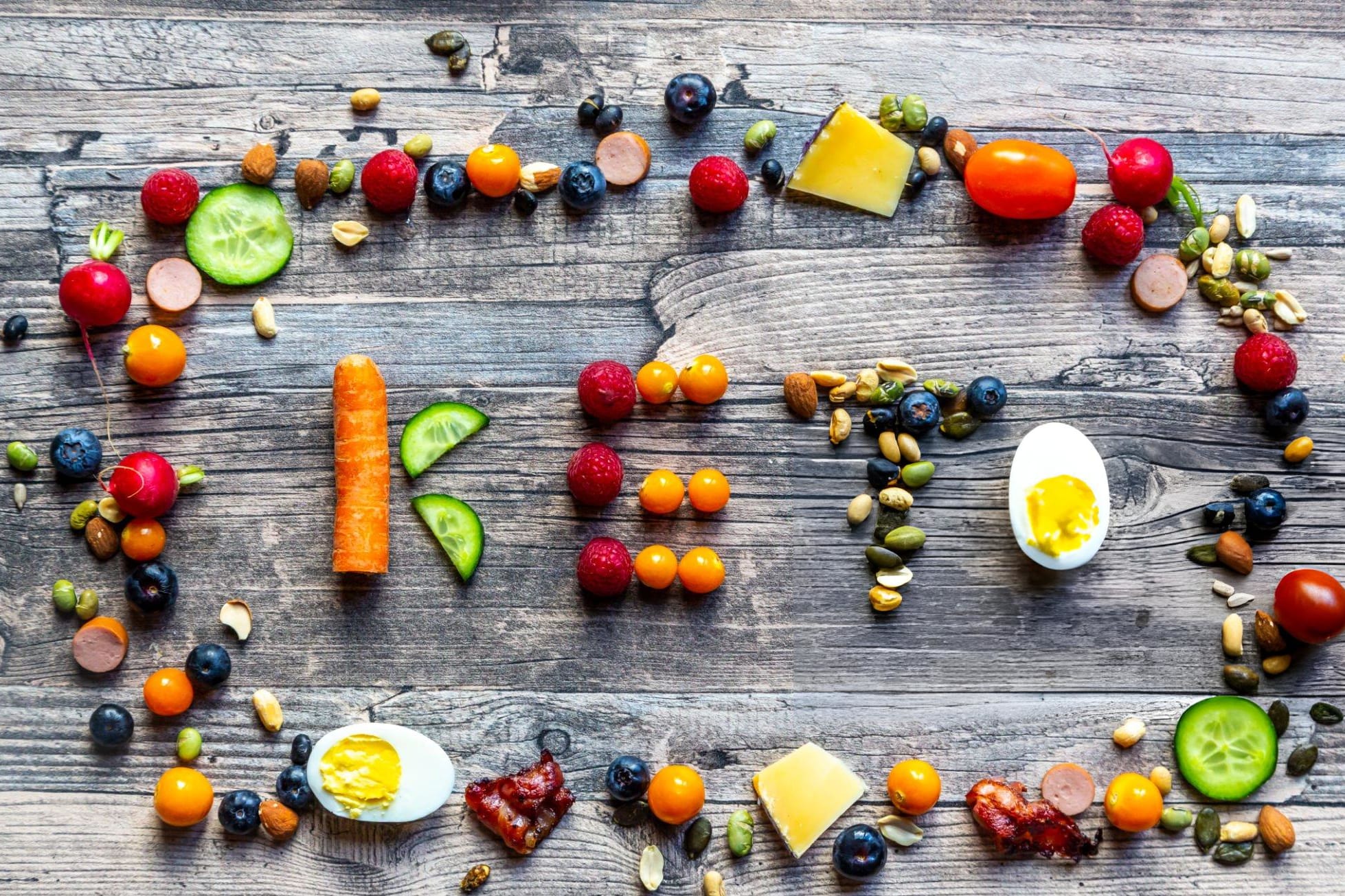 Ketogenic Diet: Everything You Need to Know about Keto Keto shaped from fruits and vegetables, framed by divers food